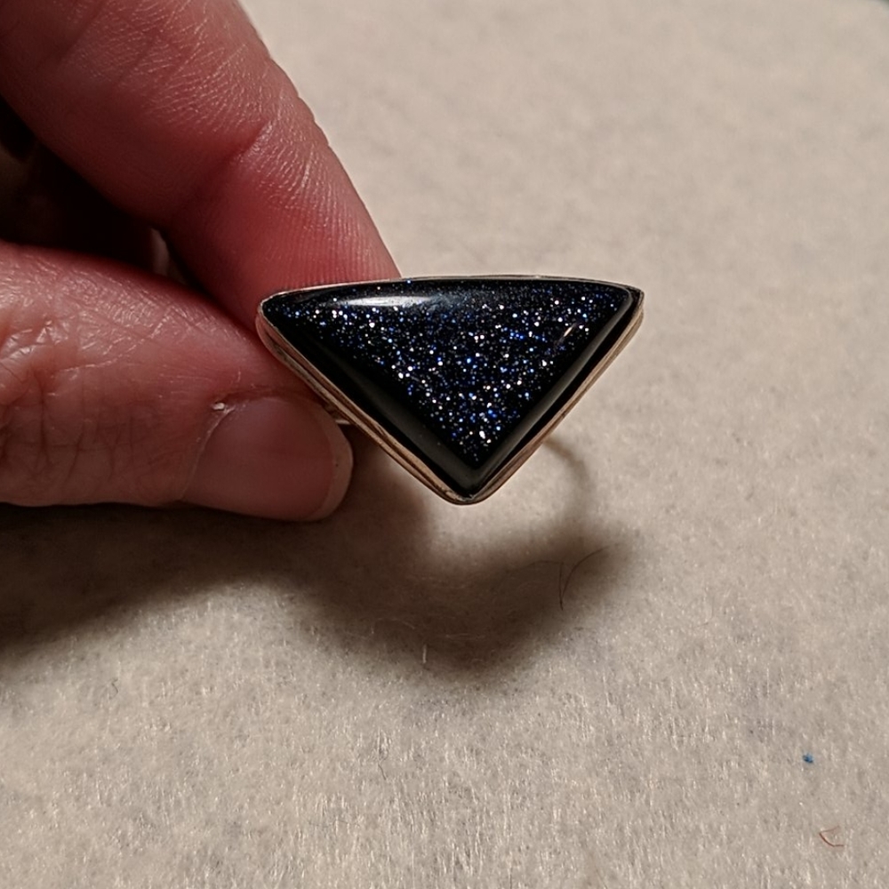 Sterling silver and purple goldstone ring